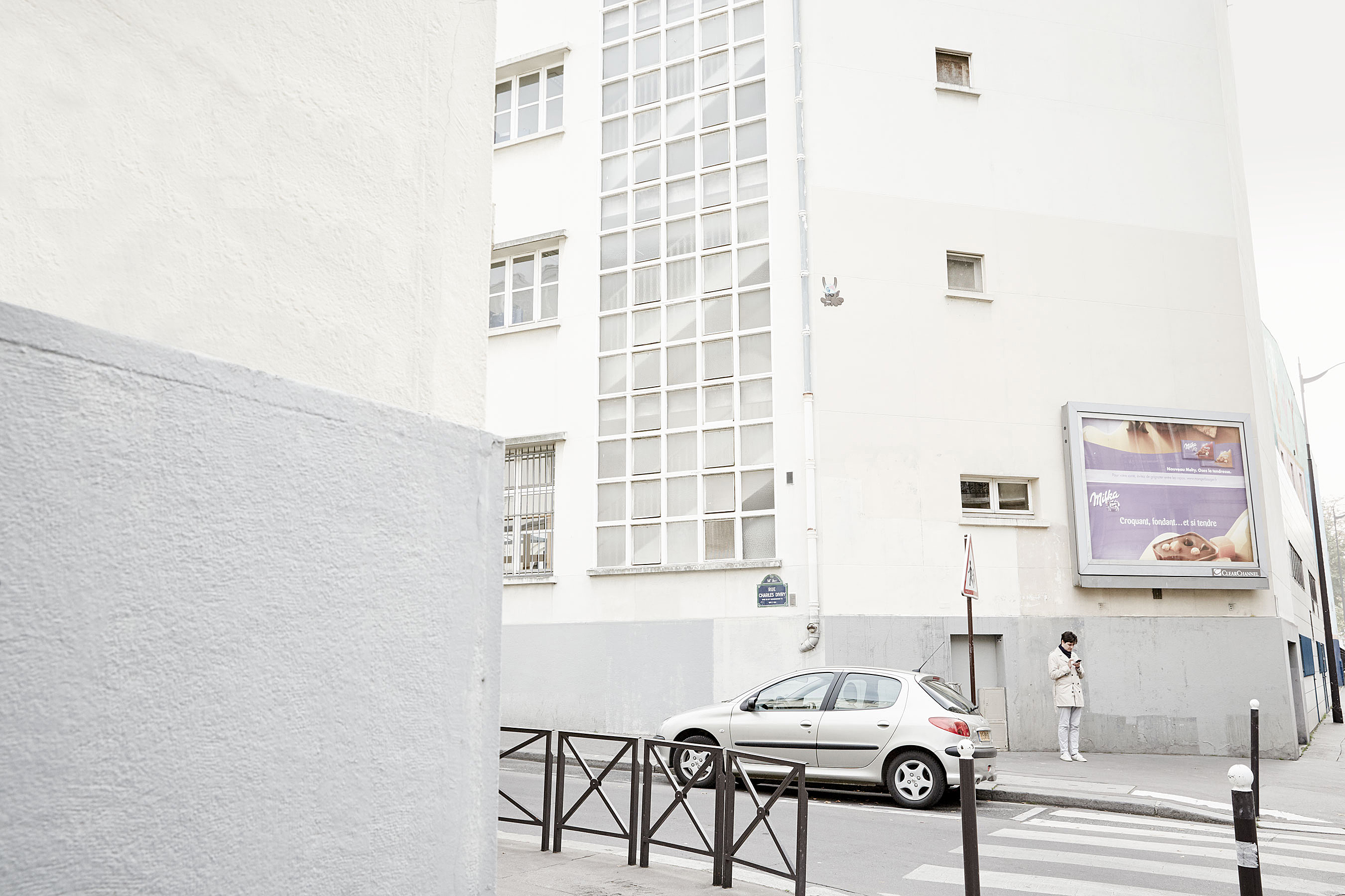 Man with white coat in Paris 