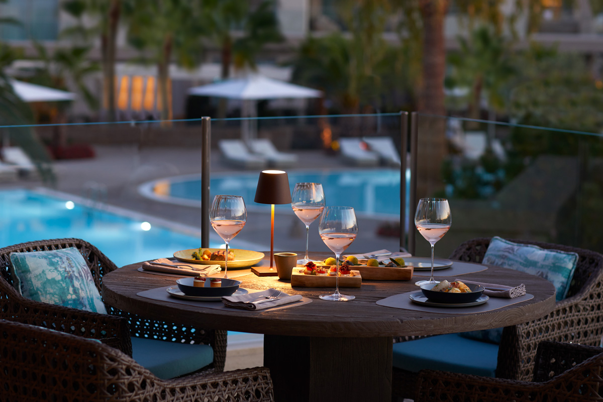 Porto Sani, Greece, El Puerto Restaurant, table with pool view, night shot
