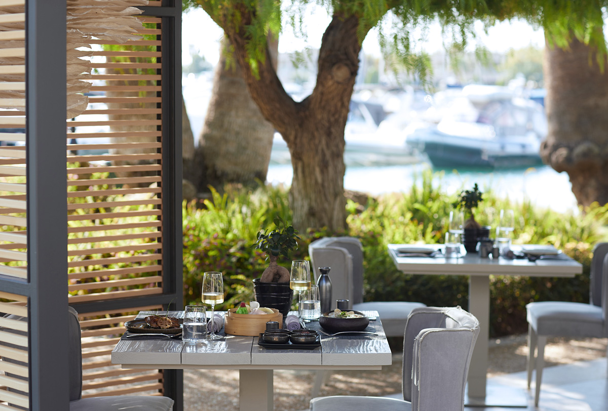Sani Marina Asian, table set in front of Marina