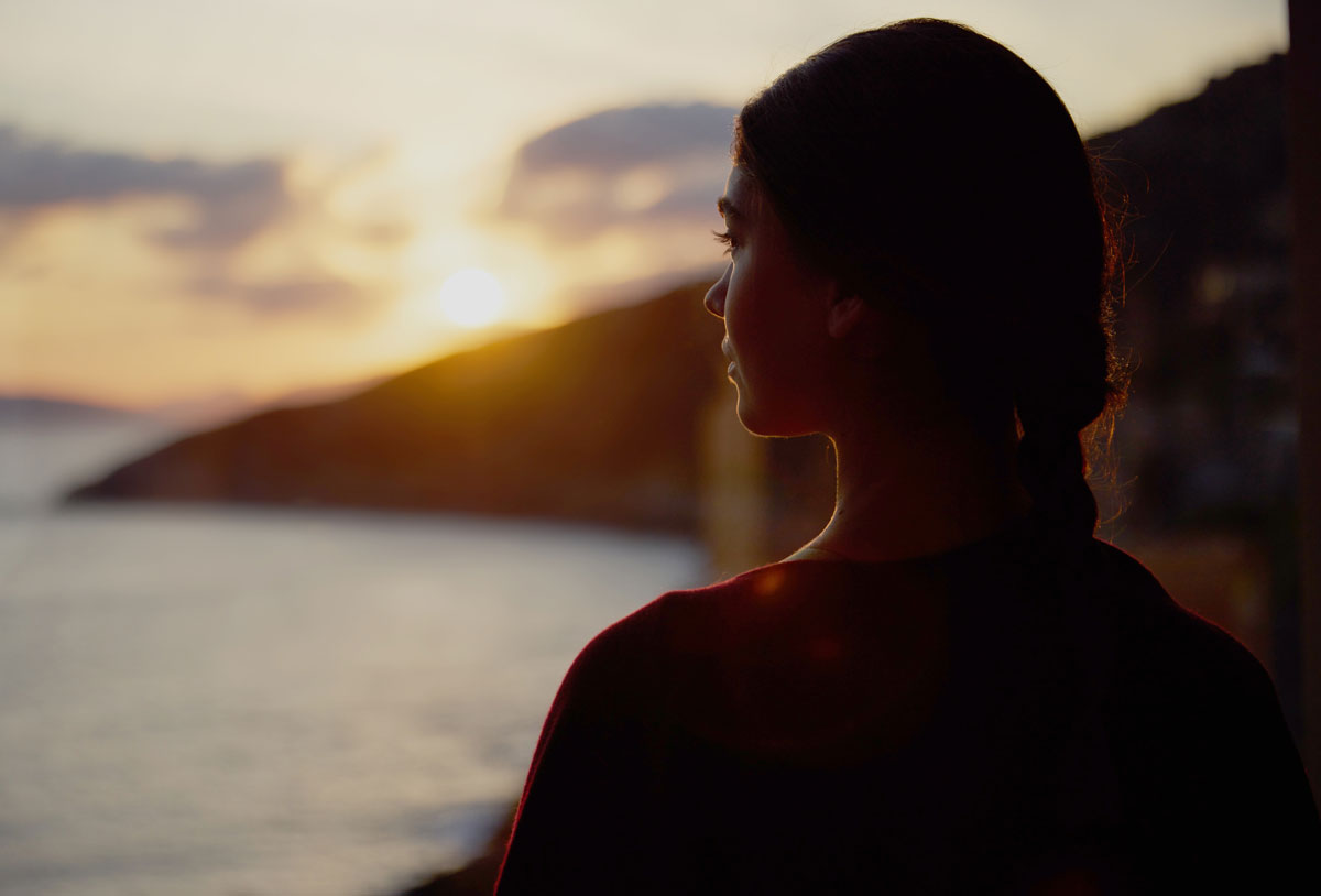 Kepos Daios Cove woman looking over the bay