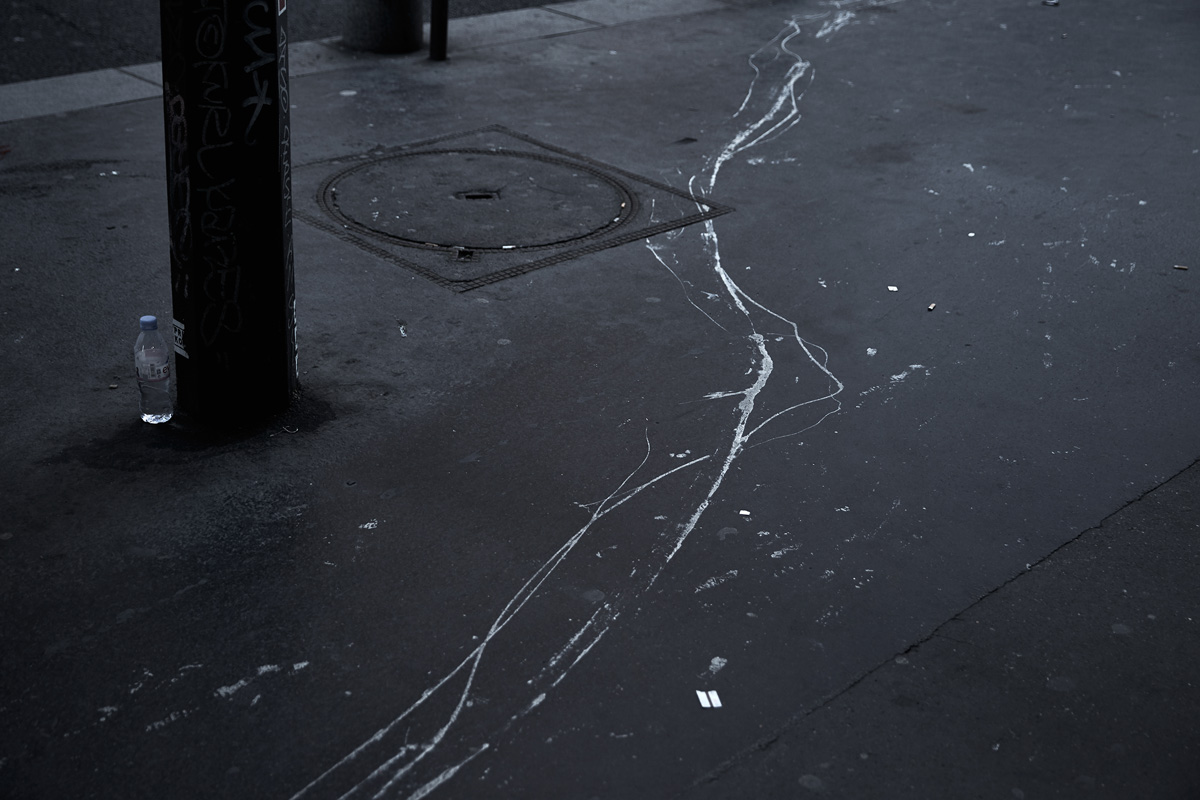 Paris asphalt and bootle of water