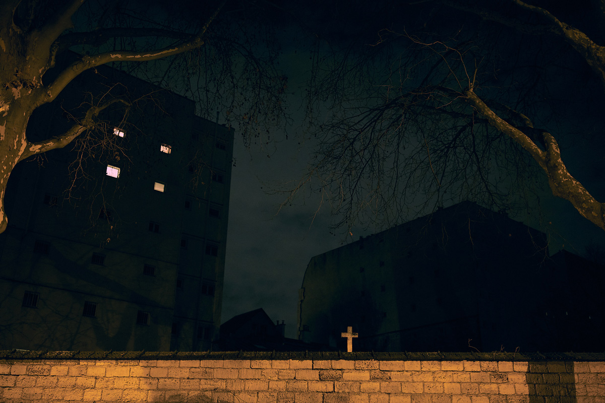 night shot of Cemetery Montparnasse , cross, walls