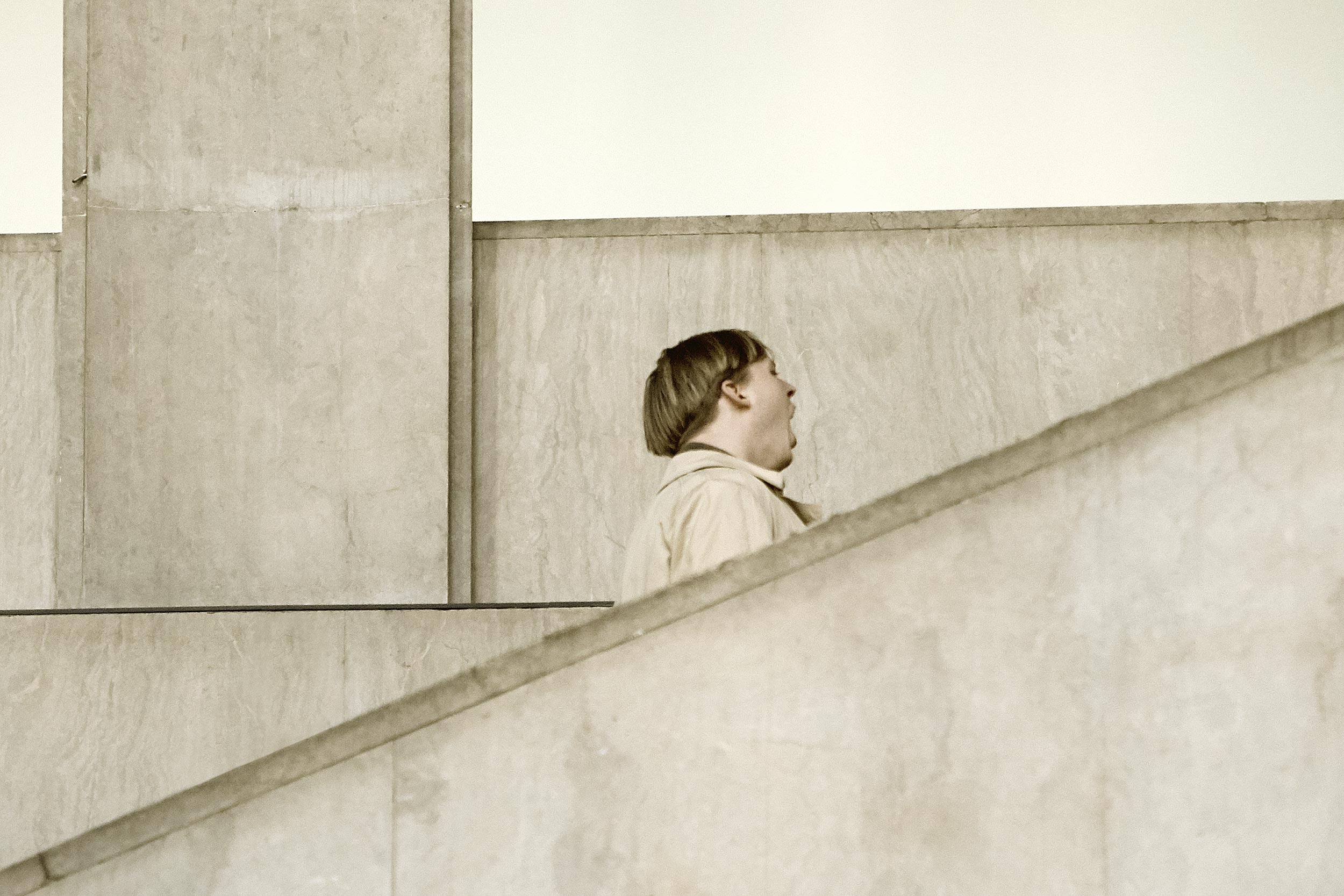 Man with open mouth at stairs, Palais de Tokyo, Paris