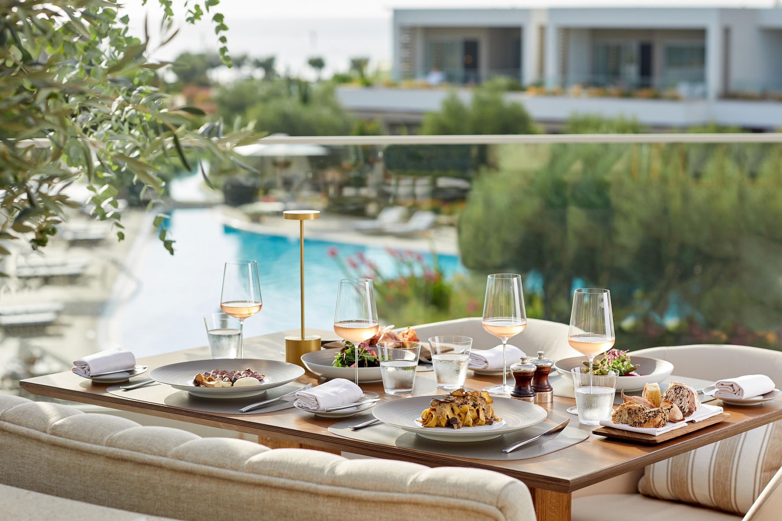 Sani Dunes, table at Fresco Restaurant, pool view 