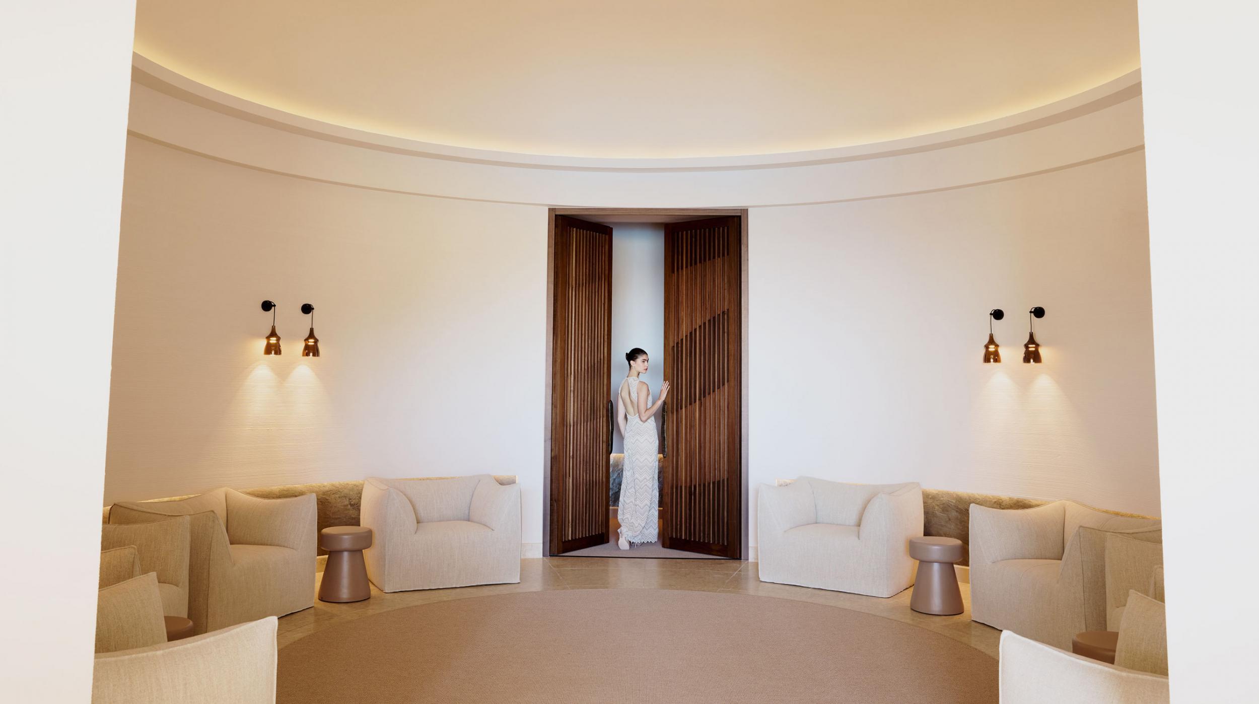 Kepos Daios Cove woman at door