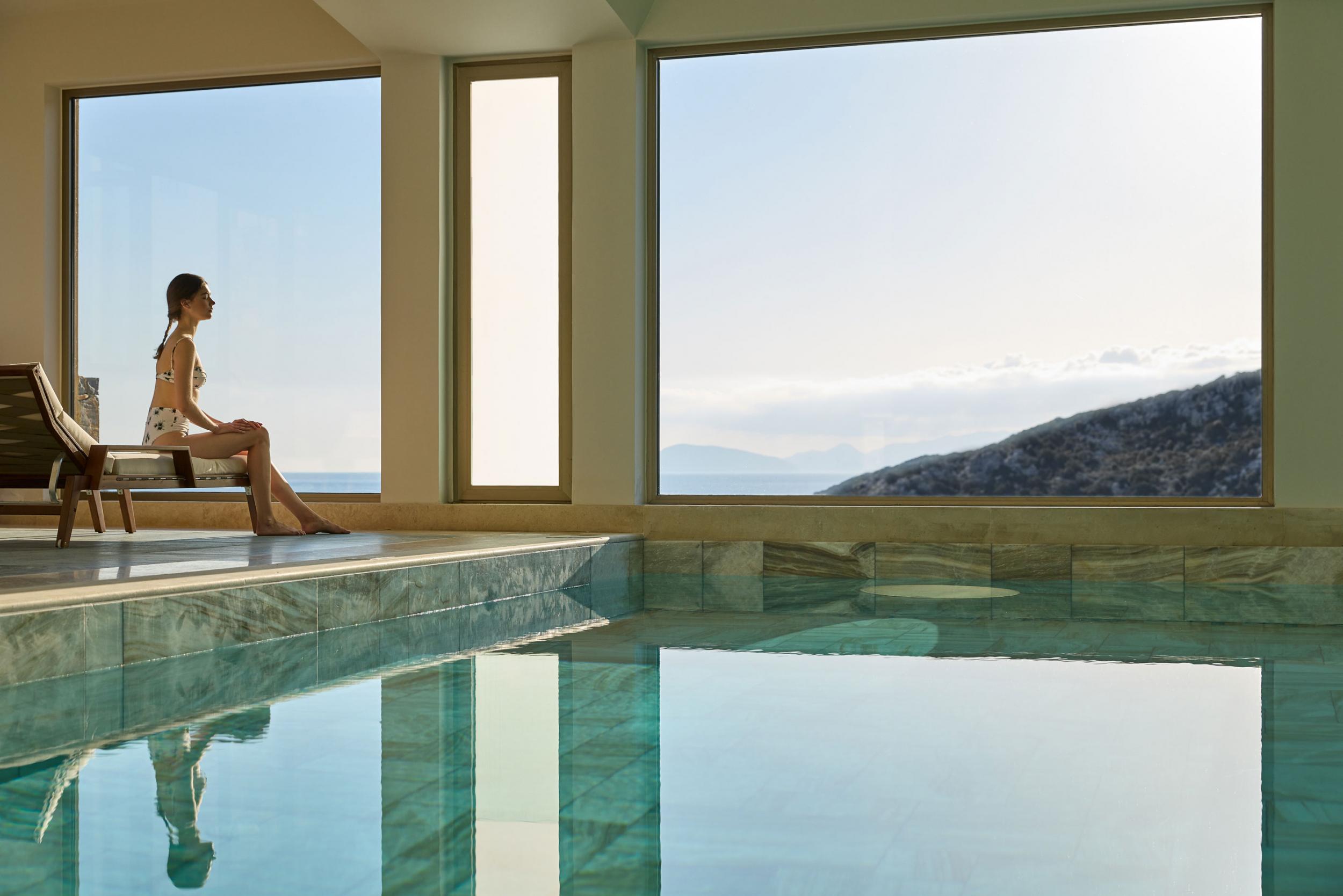 Kepos Daios Cove woman at indoor pool