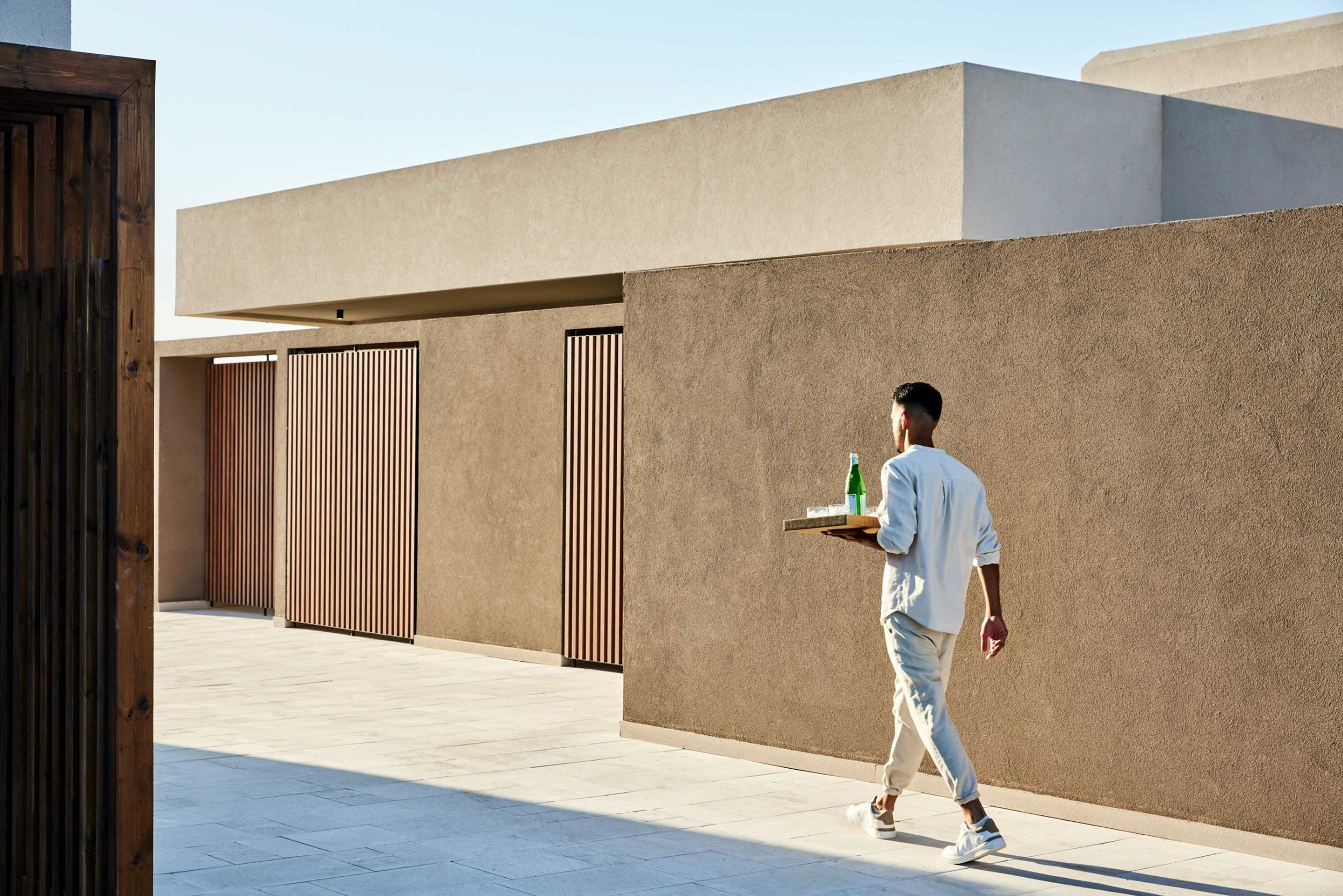 Elissa Rhodes, building, waiter with tray