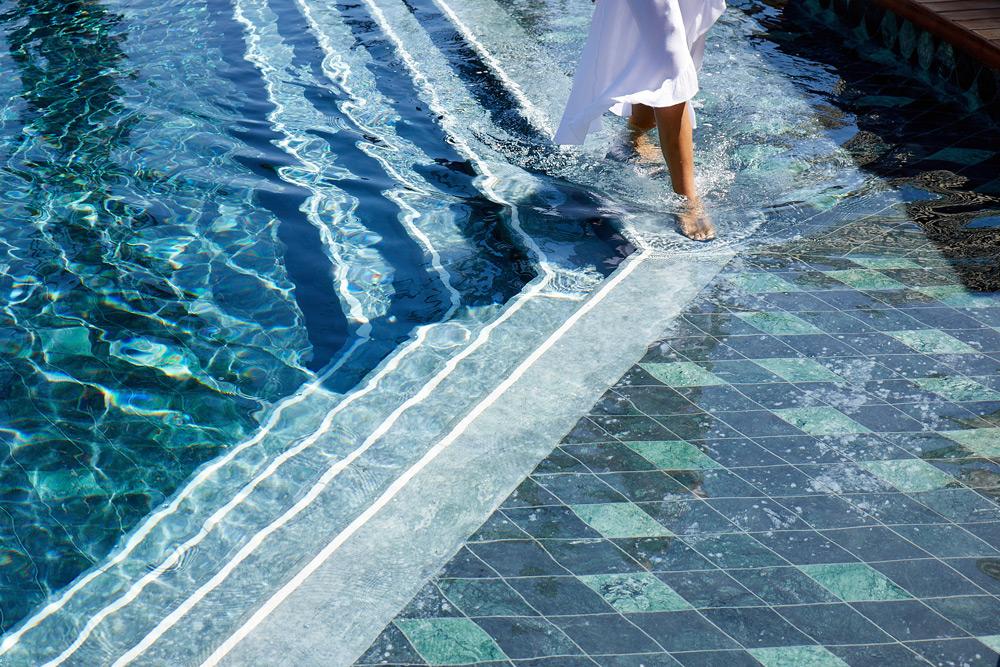 Daios Cove, Crete, new pool, stairs, woman walking, feet