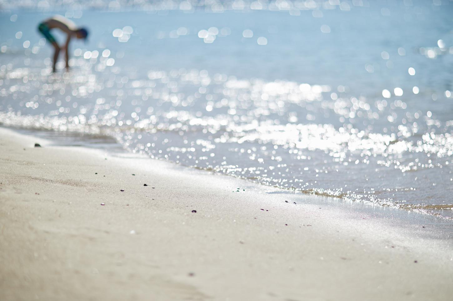 boy playing at Parga Beach. Greece