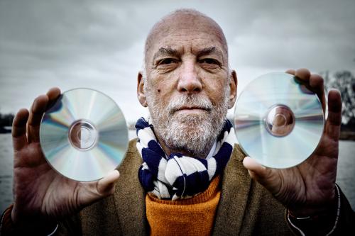 Kornelis A. Schouhamer Immink with CD in each hand