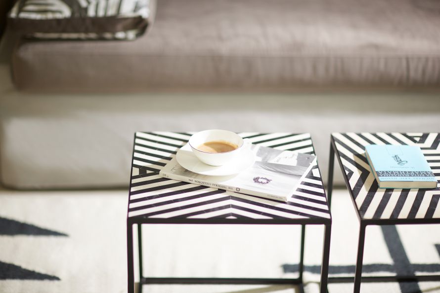 Eagles Villas, detail of living room, tables in black&white patterns