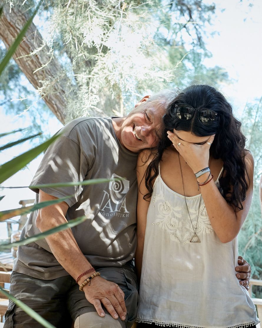 Jannis Paraskevopoulos and daughter laughing at Santorini winery
