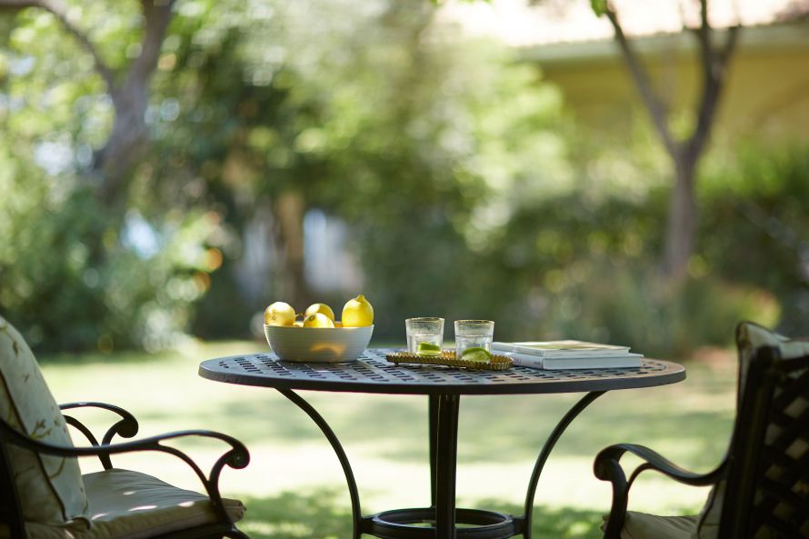 garden table with lemons and drink at Parga Beach