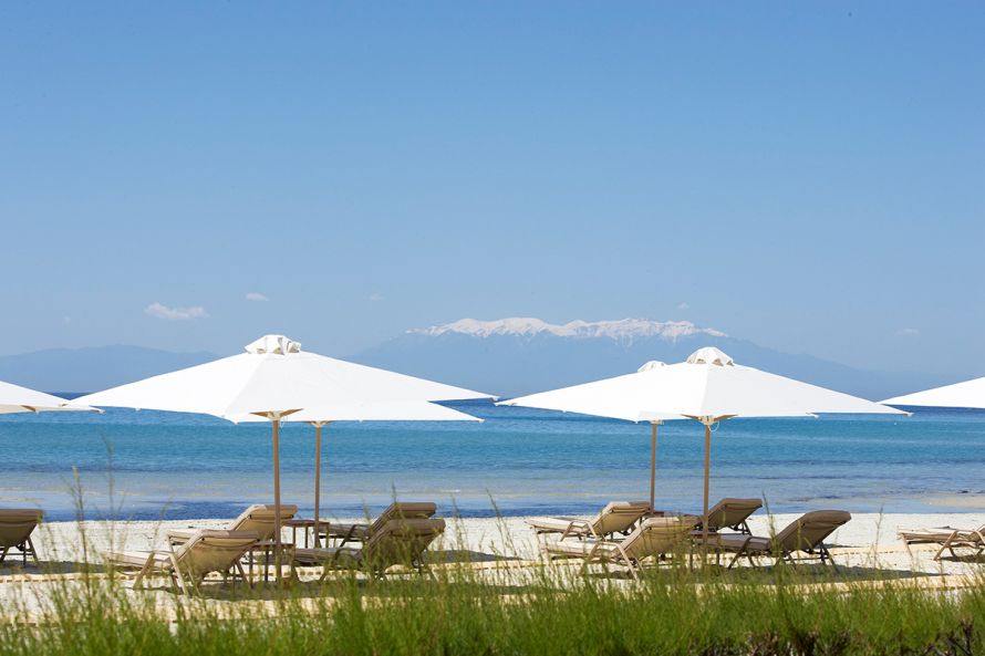 Sani Asterias Beach with snow covered Mt. Olymp