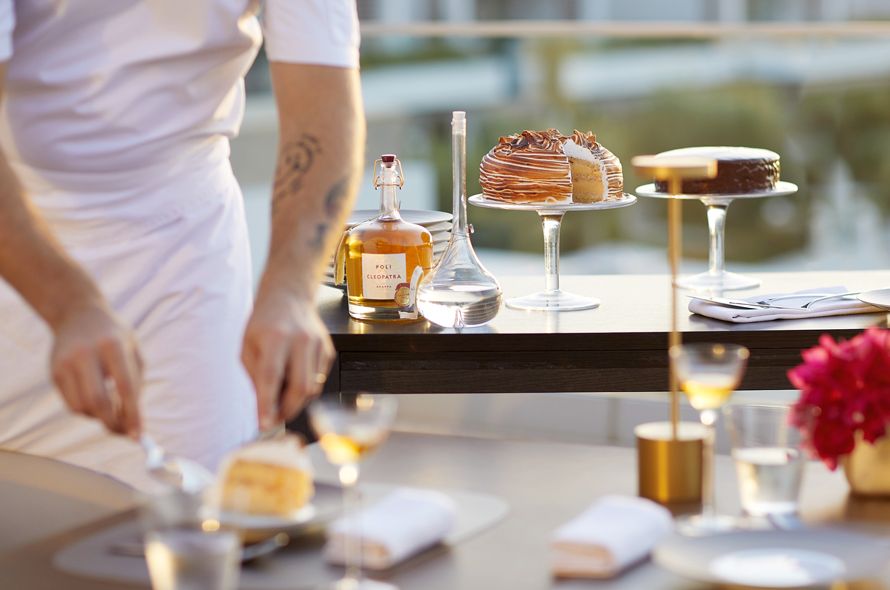 Sani Dunes Fresco, chef prepares dessert , trolley with dessert