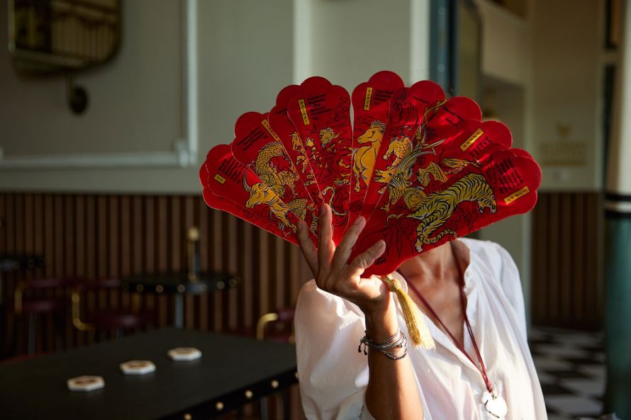ON Residence Thessaloniki, bar, woman with folding fan