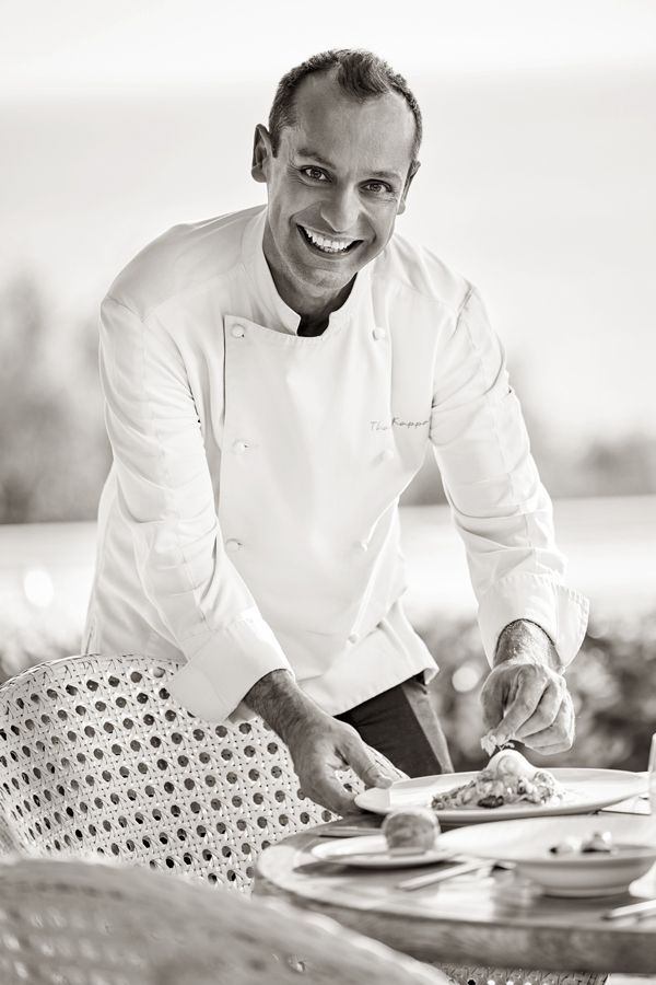 Ikos Oceania, Provence, Chef preparing dish, b&w