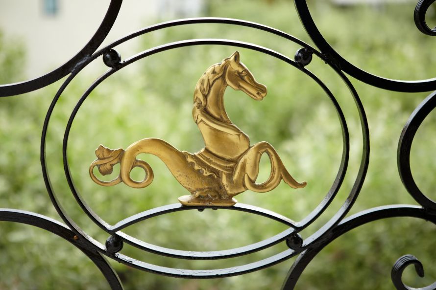 Danai logo at brass door